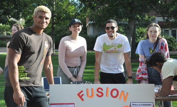 Group of students in Hamline's FUSION at the student organization fair