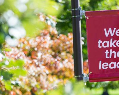 Hamline sign We take the lead 