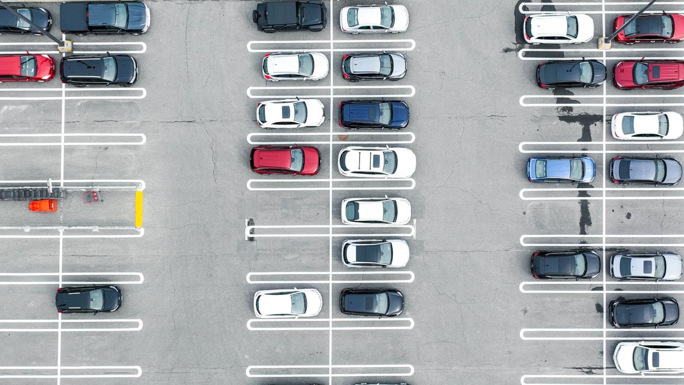 Overhead shot of cars in parking lot