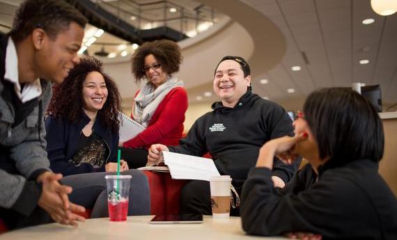 Group of Hamline students chatting in Anderson Center